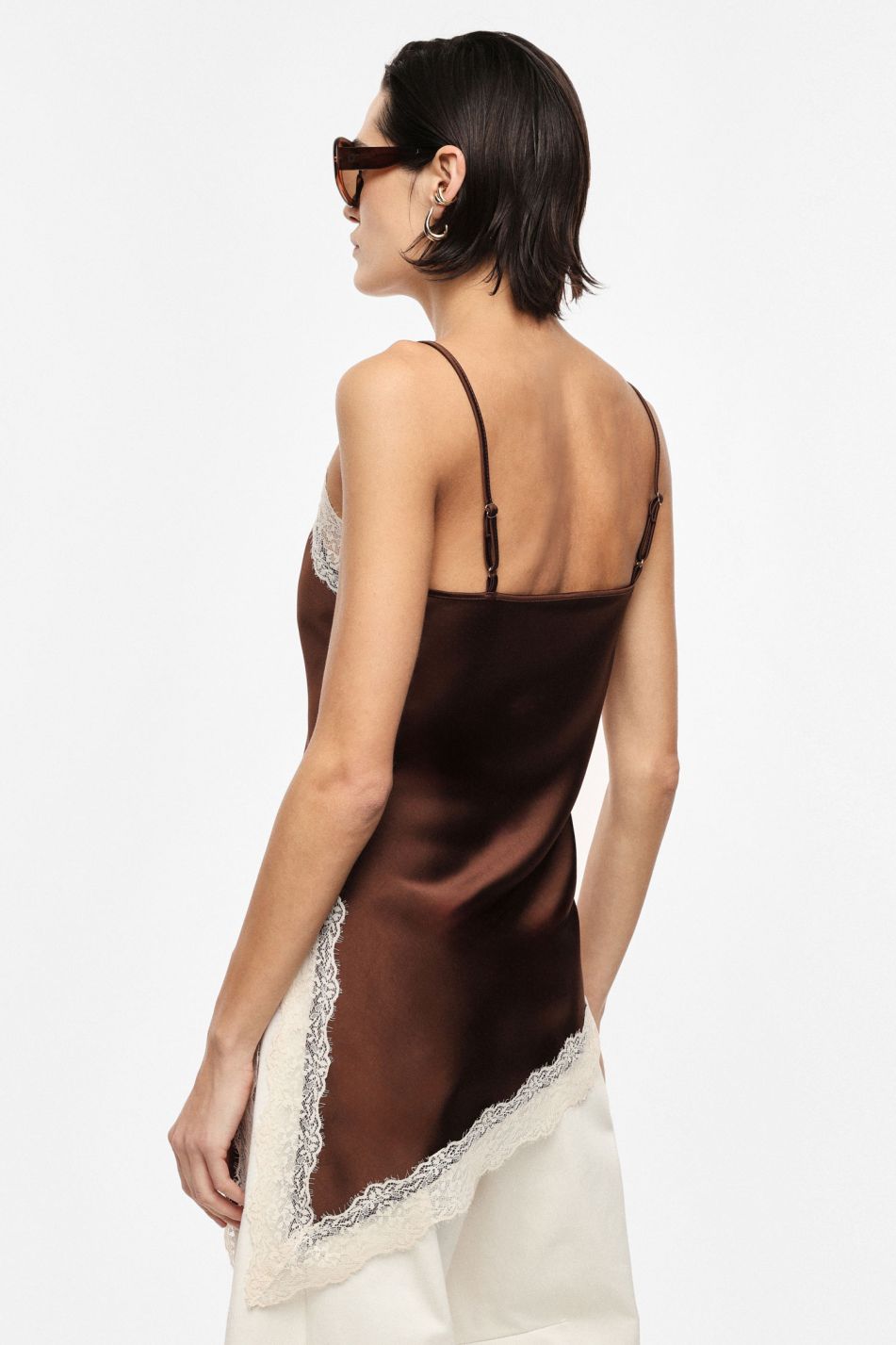 TOP ASIMMETRICO CON PIZZO E SPALLINE SOTTILI
