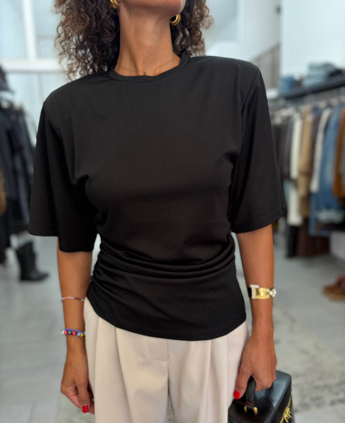 T-shirt con spalline
